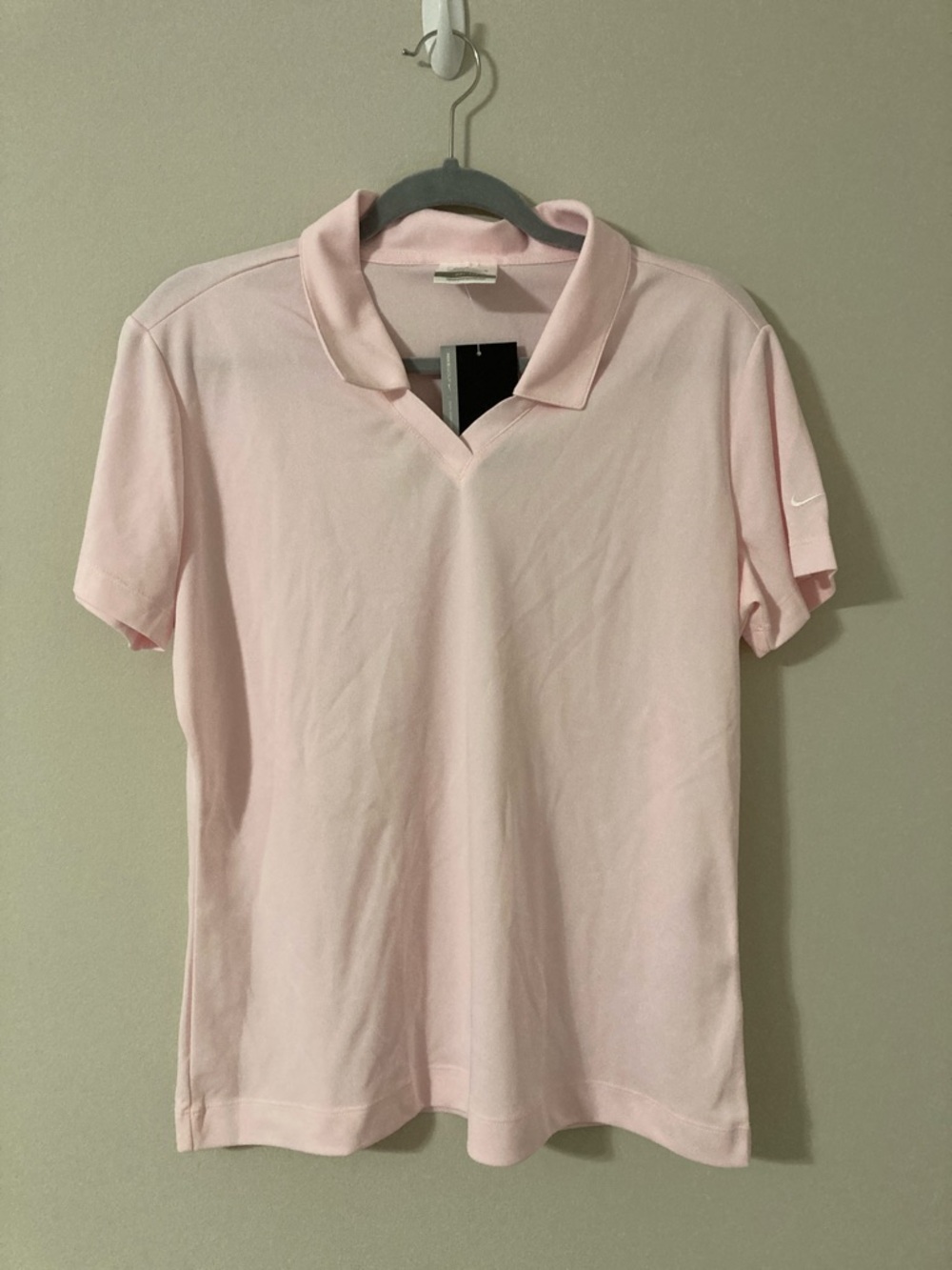 Nike Light Pink Polo Shirt with Subtle Swoosh